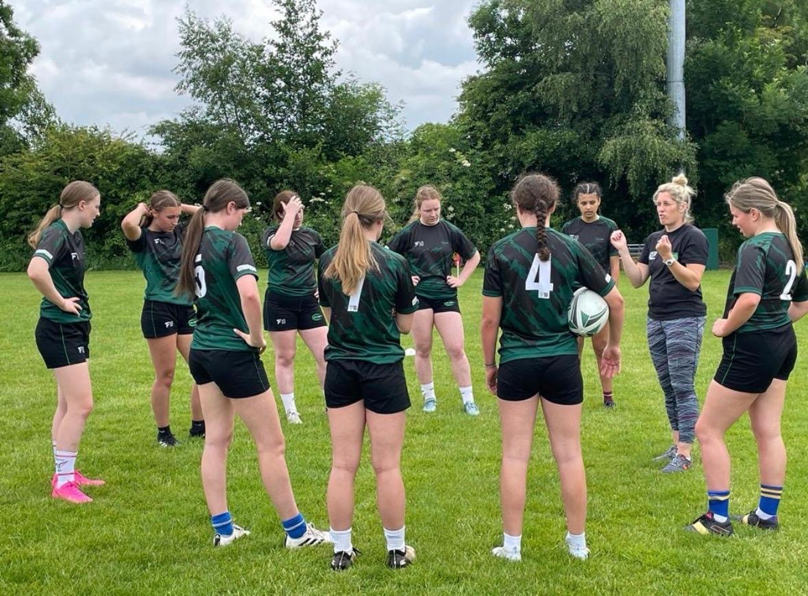 RAI Women's 7's team huddle
